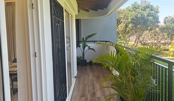 Balcony overlooking landscaped greenery